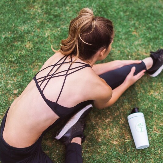 image of woman stretching