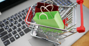 Image of keyboad and shopping cart with pkgs