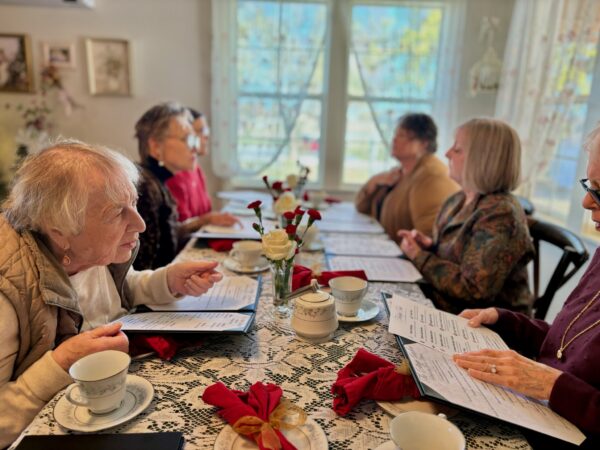 Image of ladies around tea table at Cottage Garden Tea Room