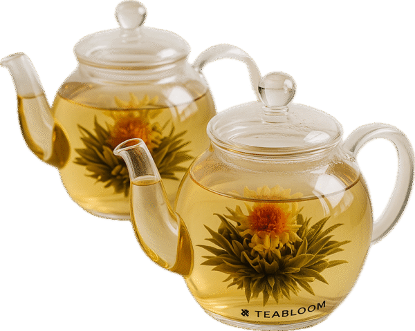 Image of two glass teapots with blooming tea